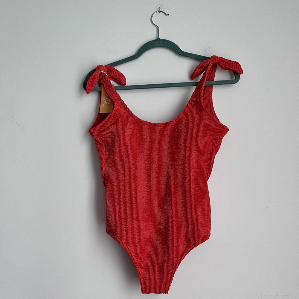 Rust Orange One Piece Swimsuit with medium cover, removable pads